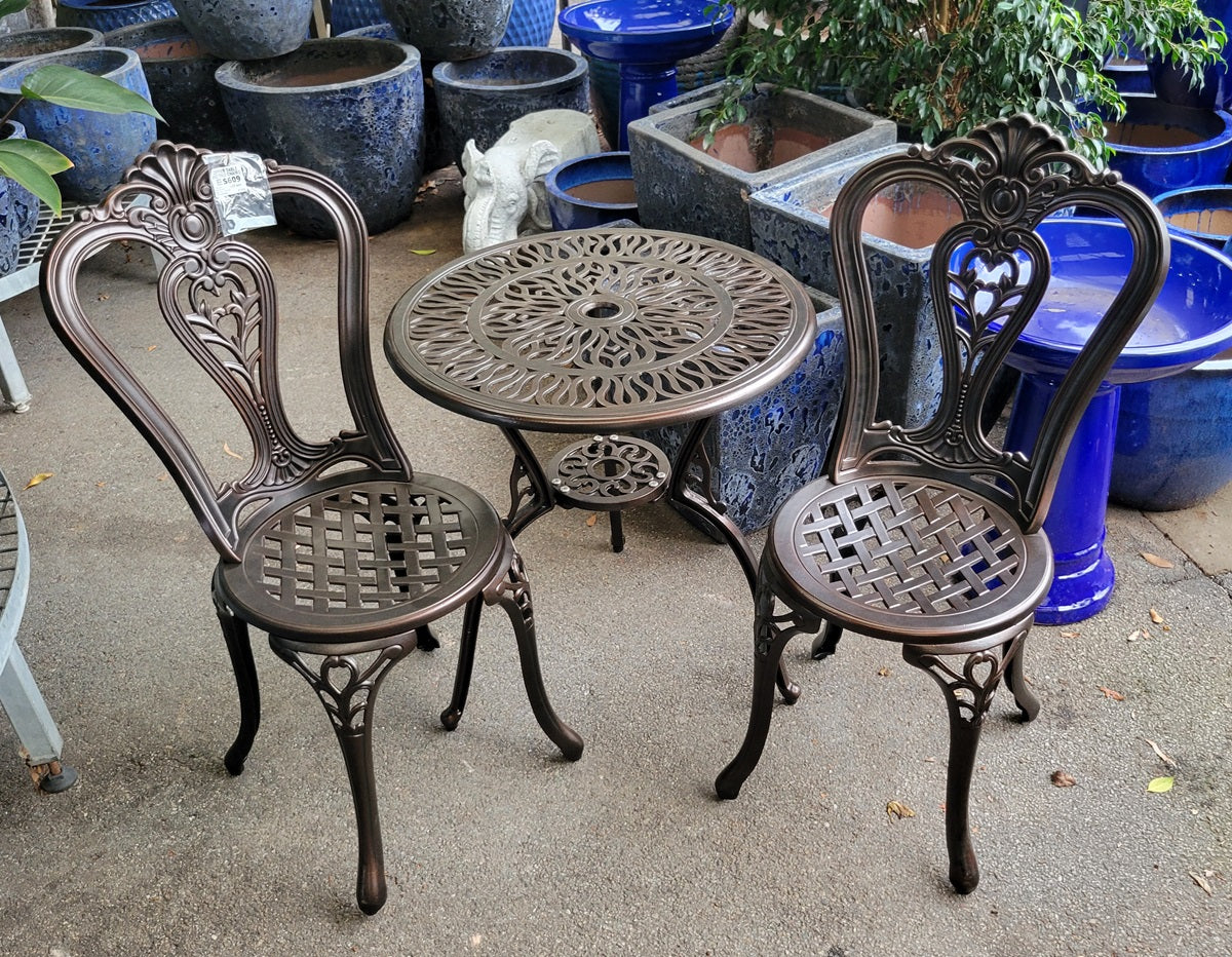 Copper Table And Two Chairs